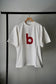 MEN/WOMEN　blurhmsROOTSTOCK / ブラームスルーツストック　bd Print Tee STANDARD