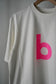 MEN/WOMEN　blurhmsROOTSTOCK / ブラームスルーツストック　bd Print Tee STANDARD